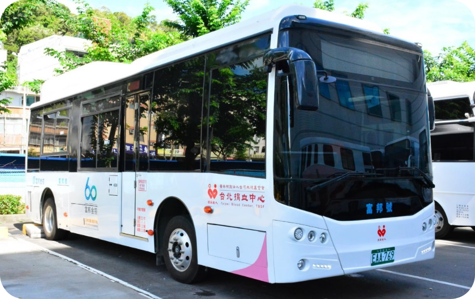 The image showcases the 'Fubon Mobile Blood Donation Unit,' the first fully electric blood donation vehicle in Asia. It provides a clean, quiet, and comfortable environment, being emission-free and noiseless.